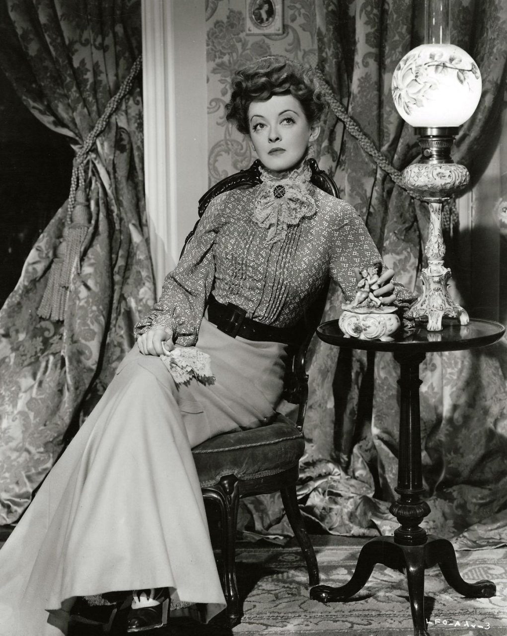 Bette Davis as Regina Giddens in a publicity photograph for The Little Foxes