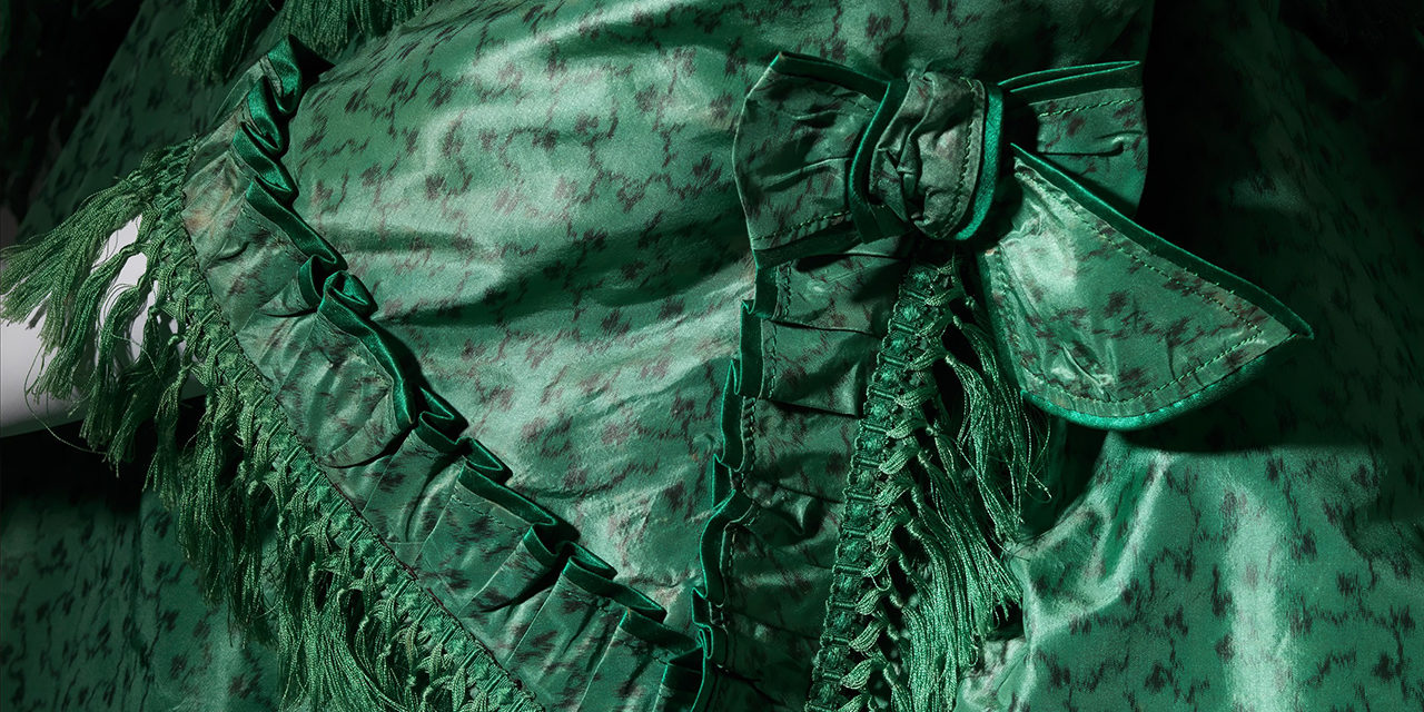 1870 – Green silk day dress with tassel trim