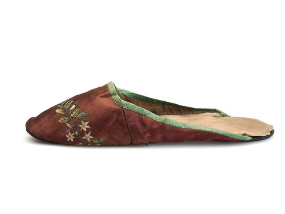 Eggplant satin mule with a band of floral embroidery across vamp and green silk binding tape