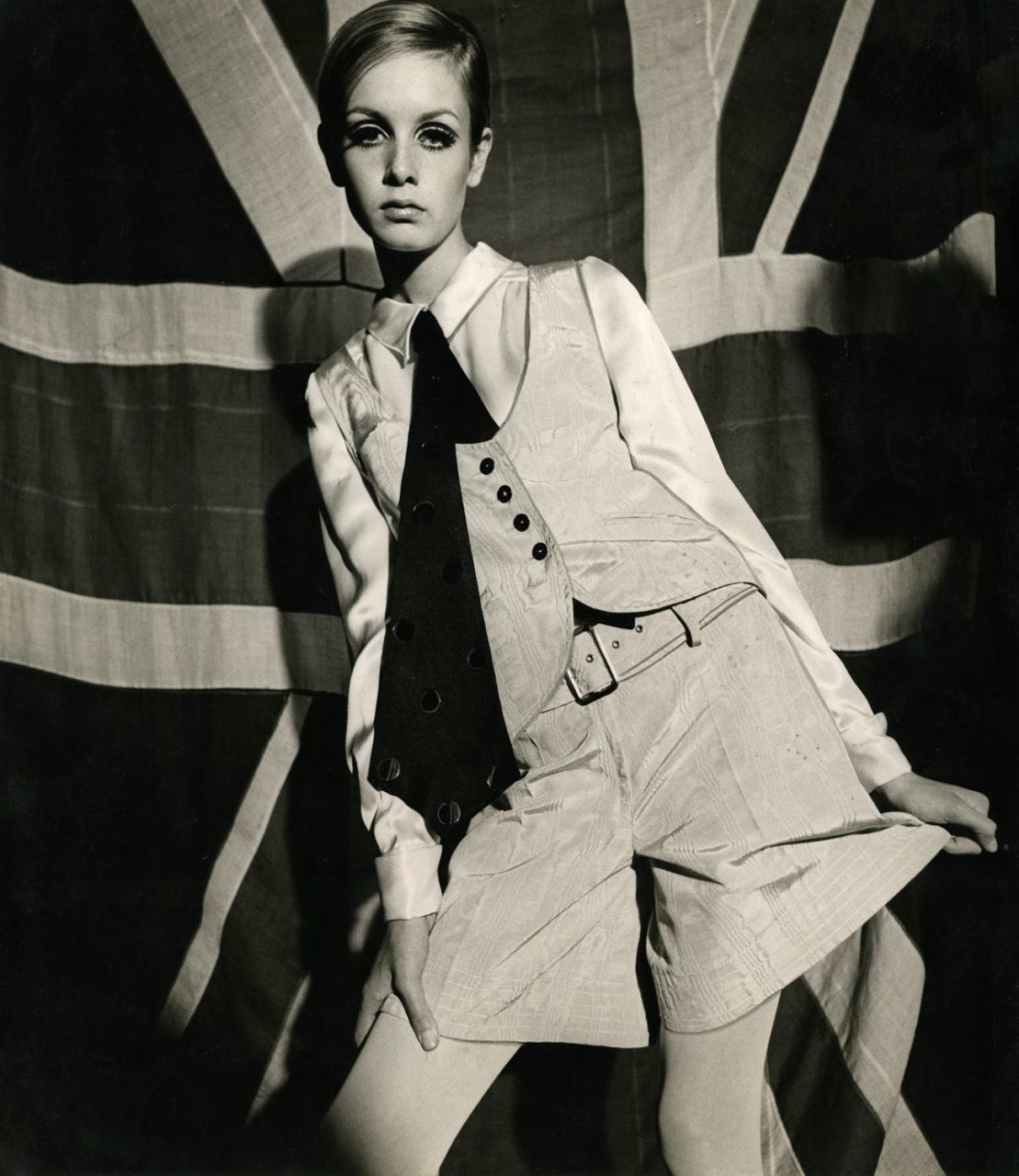 Twiggy modeling a waistcoat ensemble by Mary Quant.