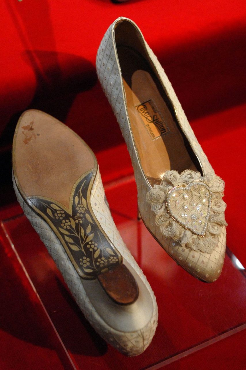 Princess Diana's wedding slippers are displayed at a preview of the traveling "Diana: A Celebration" exhibit