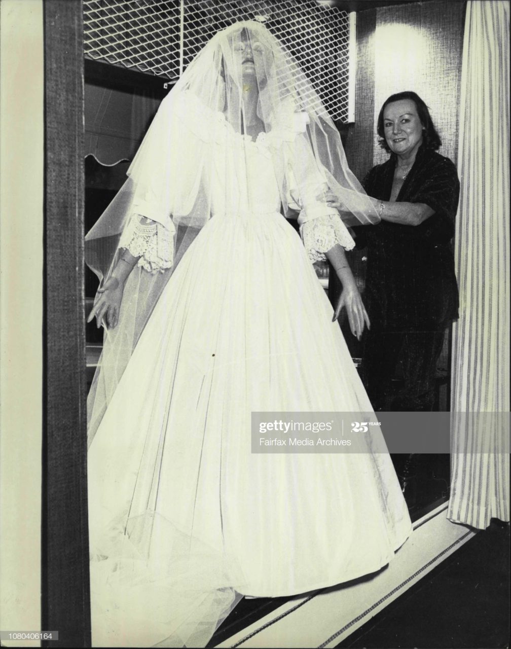 Boutique owner and designer Miss Brown of double bay with her replica of the wedding dress worn by the Princess of Wales, Lady Diana Spencer