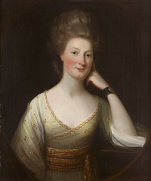Bust length portrait of a lady in a green and gold