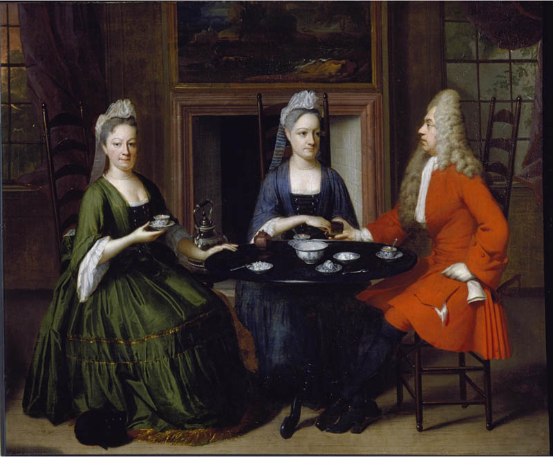Two ladies and an officer seated at tea