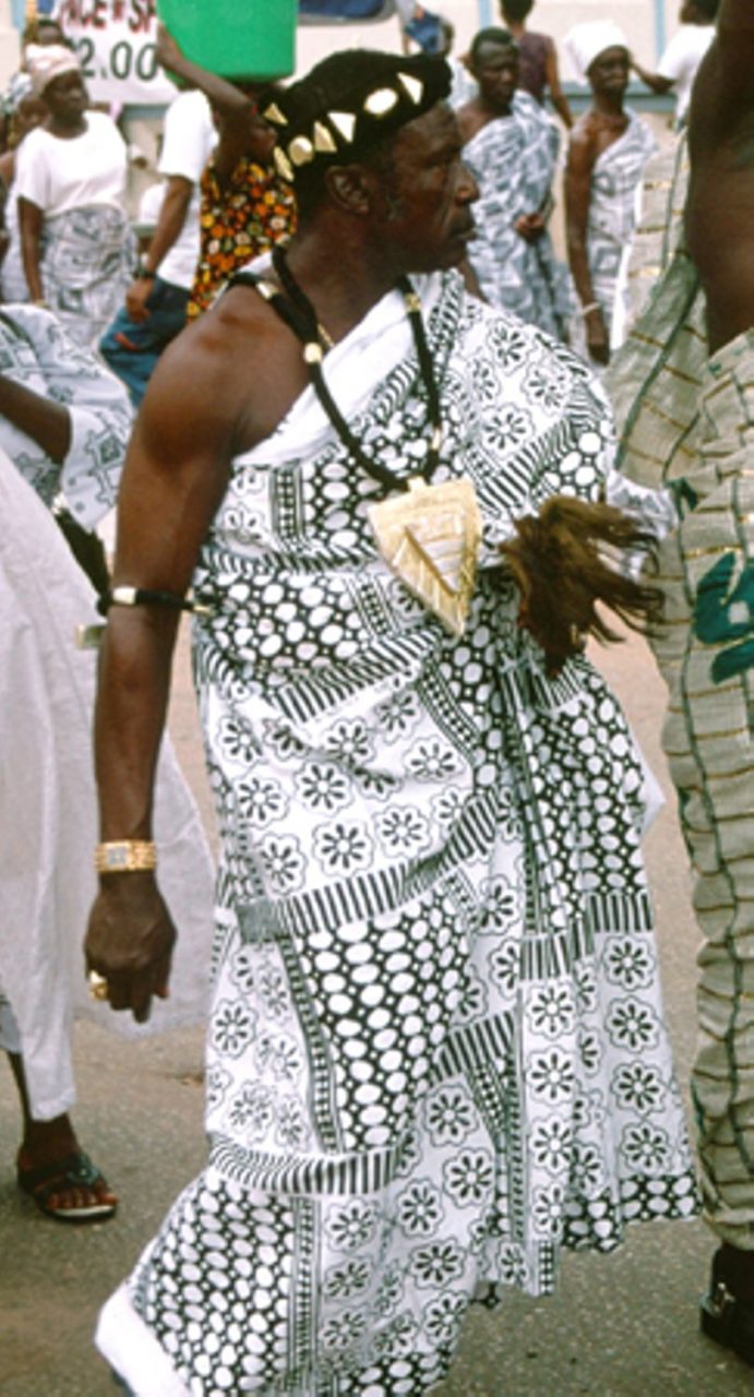 Asante divisional chief in silk-screened adinkra cloth
