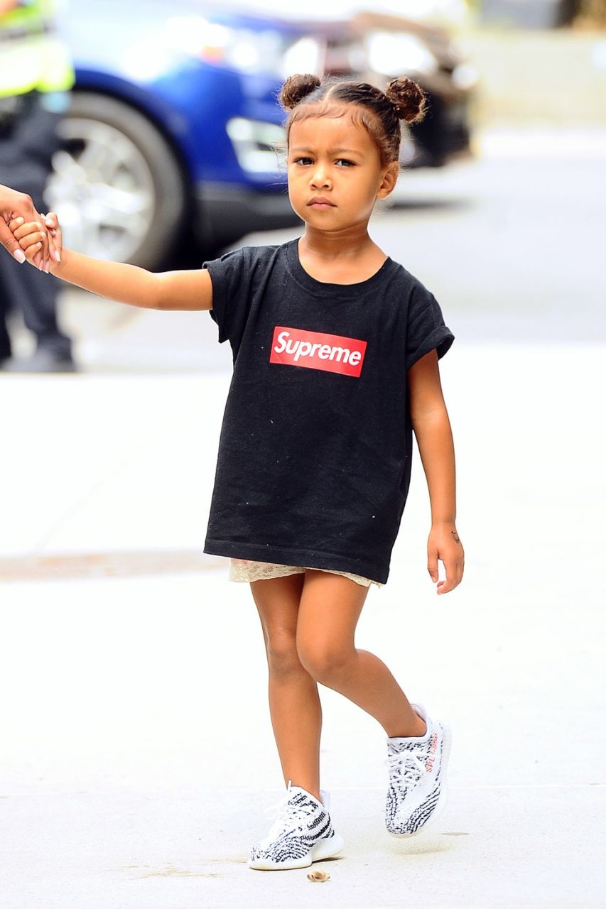 North West in Supreme and Yeezys